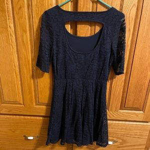 Navy Blue dress with lace sleeve and open cut out back.